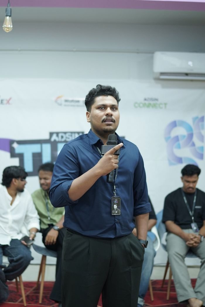 Jasim CP speaking on stage at the Adsin Connect event