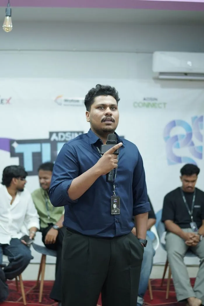 Jasim CP speaking on stage at the Adsin Connect event