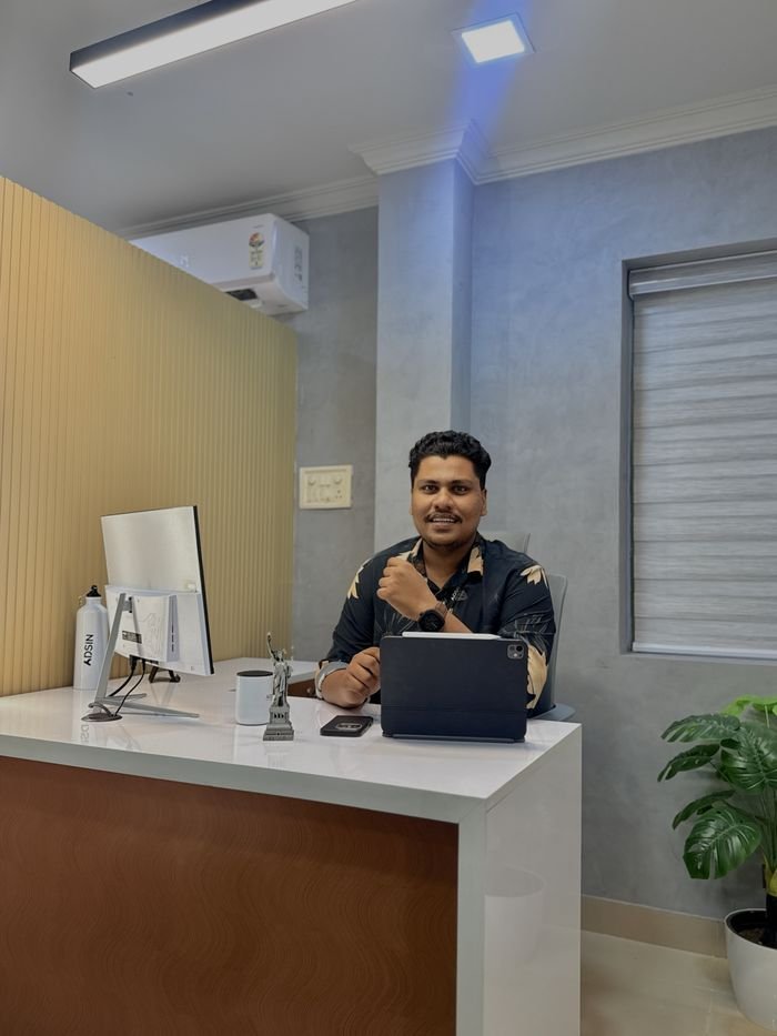 Jasim CP working at his desk at Adsin Learning Hub